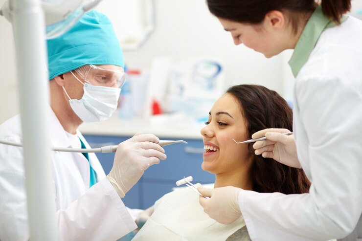 dentist-examining-patient-s-teeth